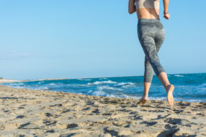 Lady running on the beach