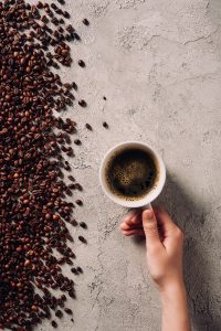 Coffee beans and a cup of coffee