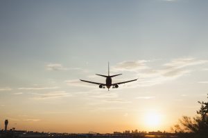 plane landing at sunset